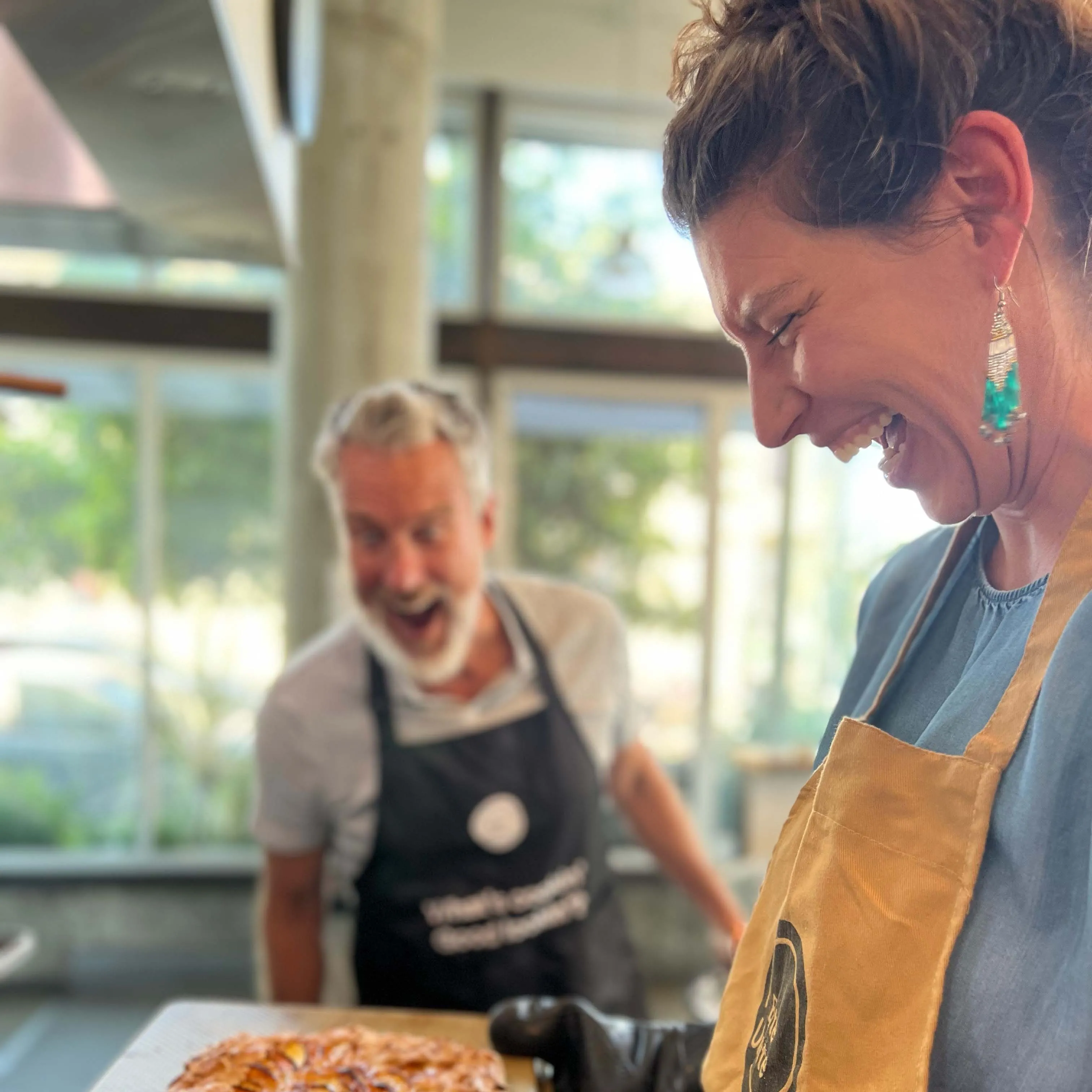 american chef looking over students creation at BiteUnite