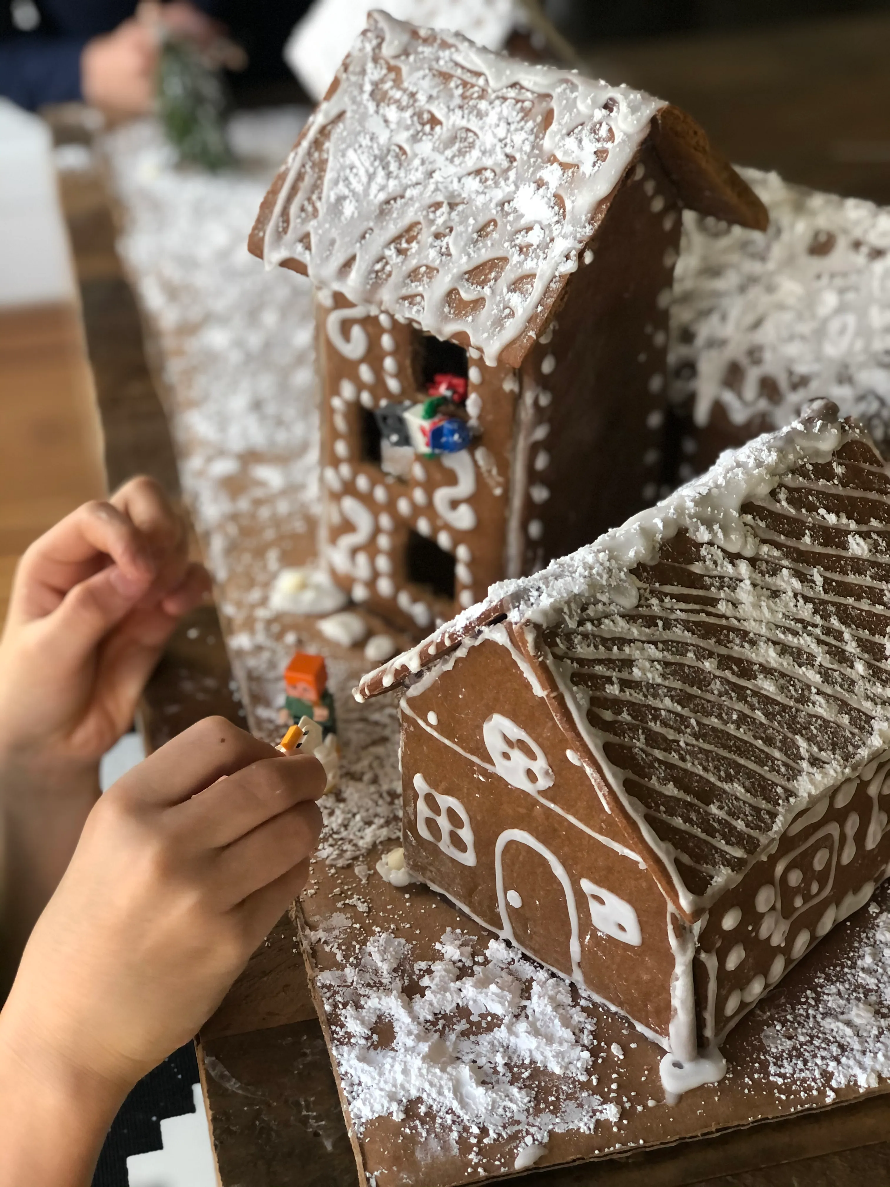 gingerbread house made during holiday cooking class
