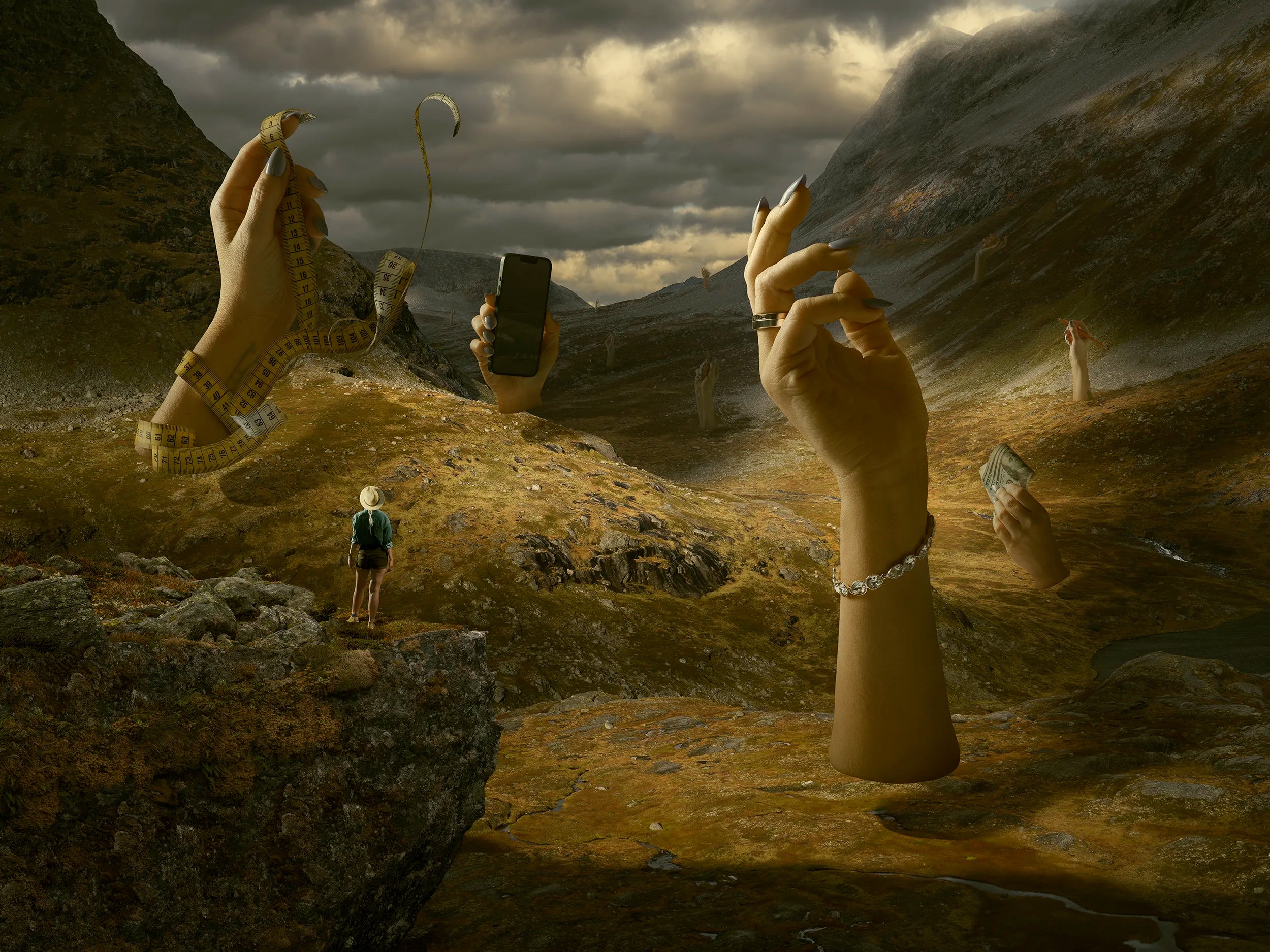 Majestic landscape with large hands holding a phone and measuring tape, a person standing on a cliff, and mountains in the background.
