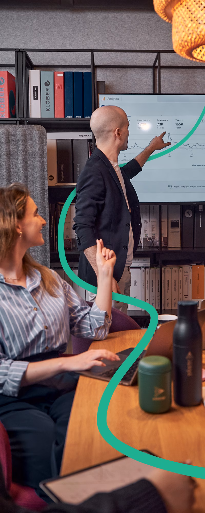 Matt Jaworski presenting digital marketing analytics while Katherine Keddie and team discuss climate tech client growth and lead generation strategy