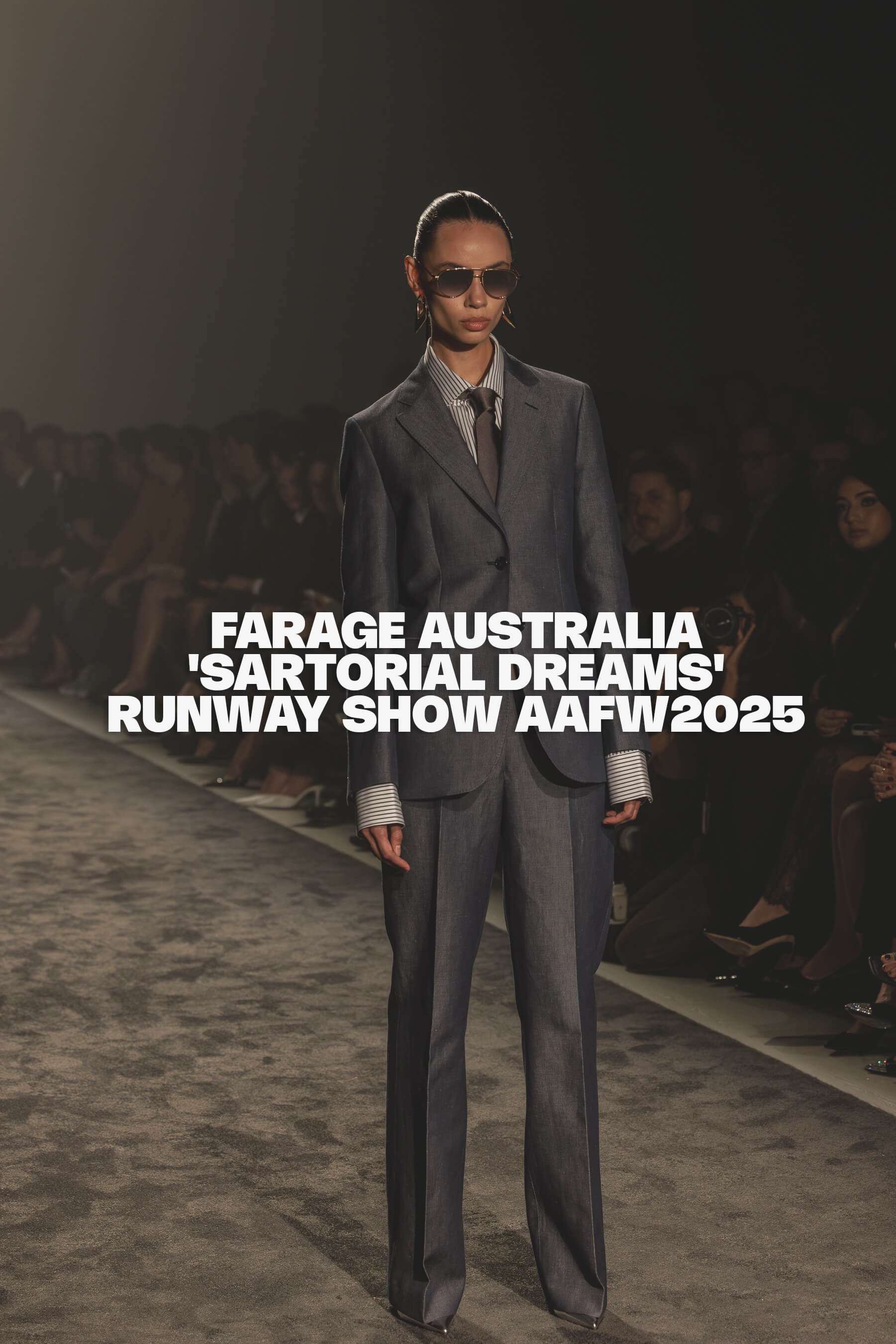 Model in a sharp grey suit and sunglasses walking the Farage Australia “Sartorial Dreams” runway at Australian Fashion Week 2025, with bold event title overlaid in burnt orange text.