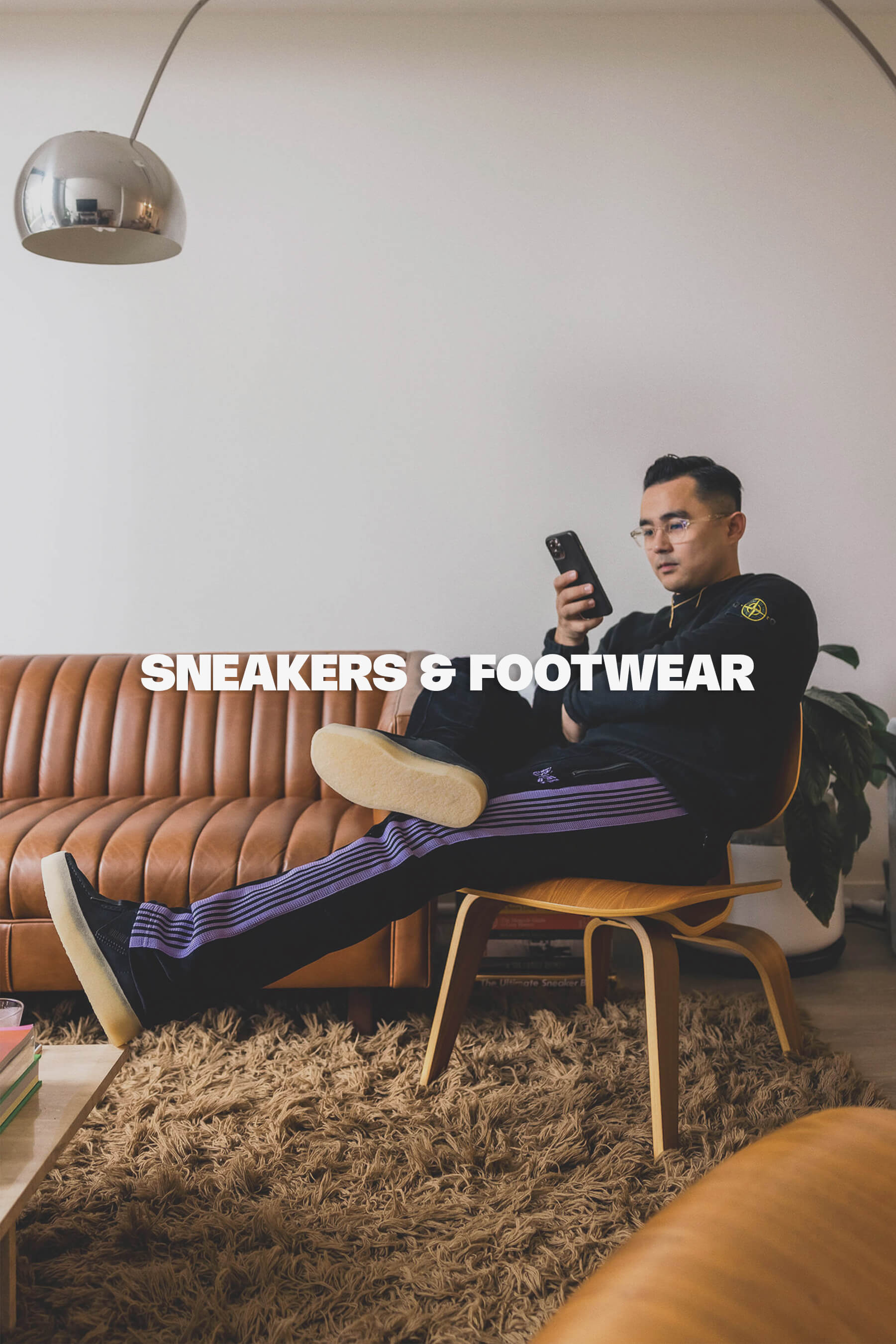 Sneakers & Footwear Banner photography by Eugene David Grey in a modern living room with designer furniture