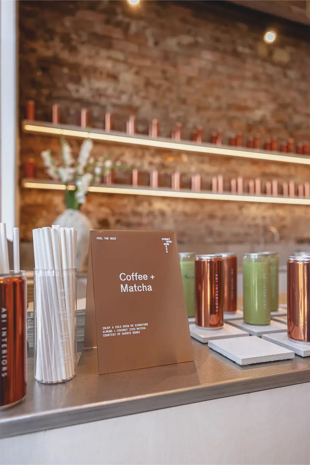 ABI Interiors Sydney showroom interior during launch event featuring contemporary fixtures, clean architectural lines, and styled product displays