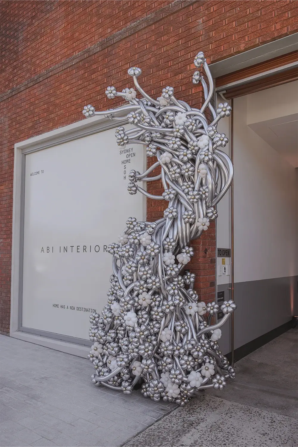 ABI Interiors Sydney showroom interior during launch event featuring contemporary fixtures, clean architectural lines, and styled product displays