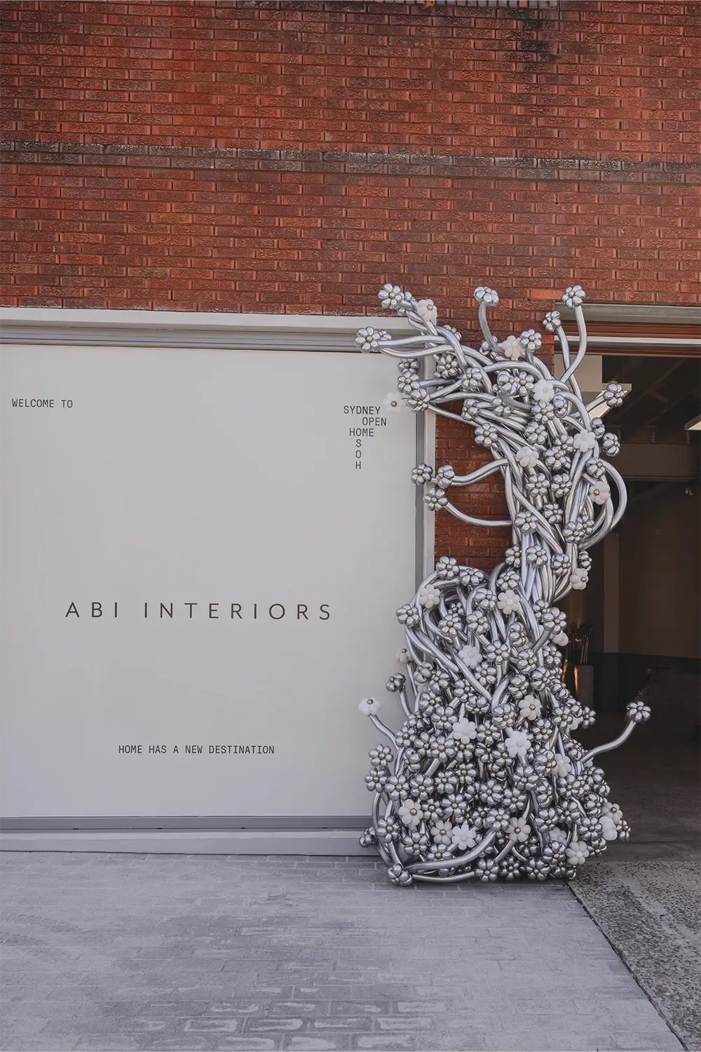 ABI Interiors Sydney showroom interior during launch event featuring contemporary fixtures, clean architectural lines, and styled product displays