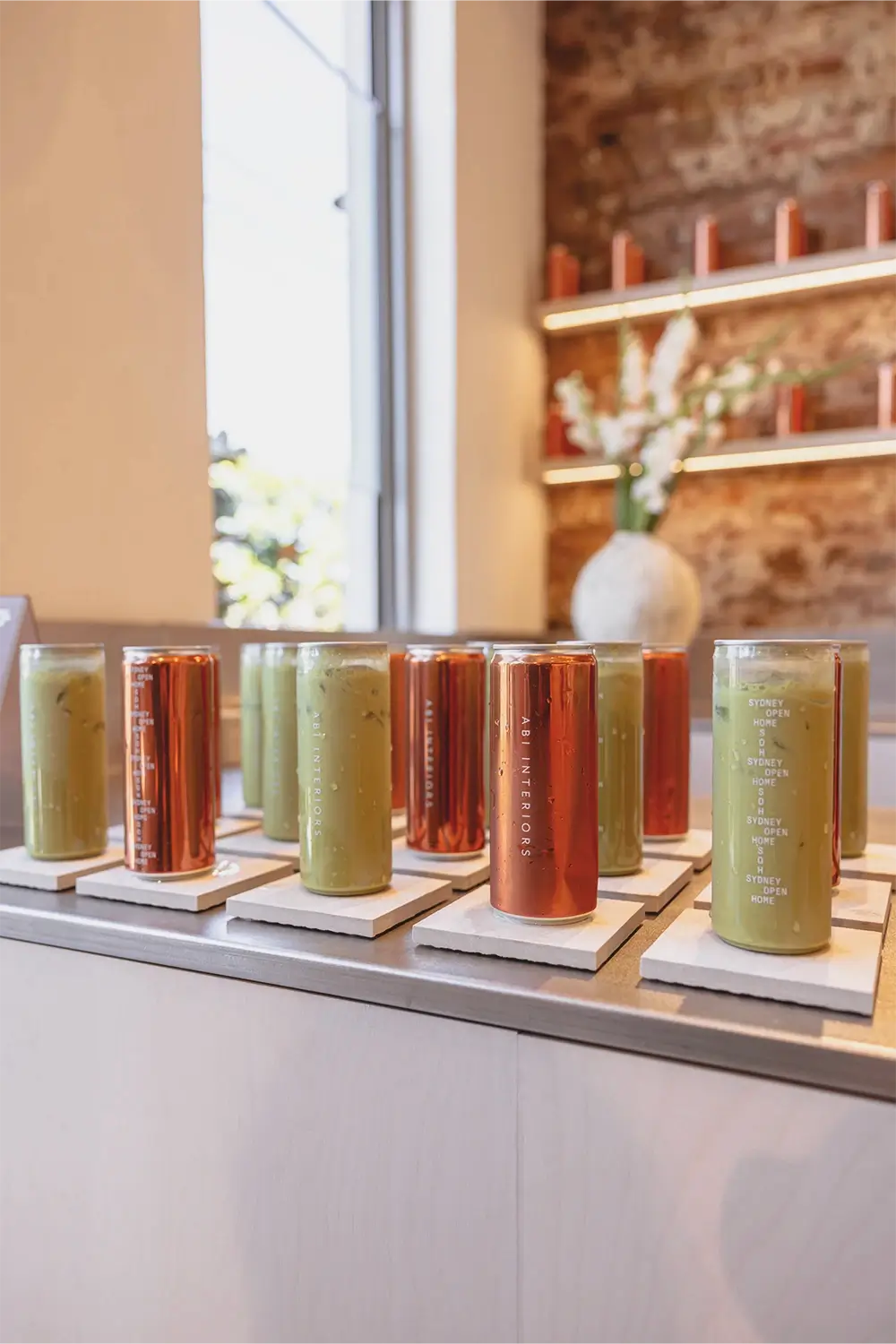 ABI Interiors Sydney showroom interior during launch event featuring contemporary fixtures, clean architectural lines, and styled product displays