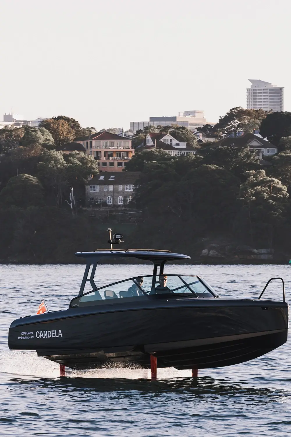 Polestar and Candela collaboration captured at Sydney Harbour Concours d’Elegance, featuring the Candela C-8 Polestar edition electric hydrofoil boat alongside Polestar vehicles, photographed by EDG Studios.