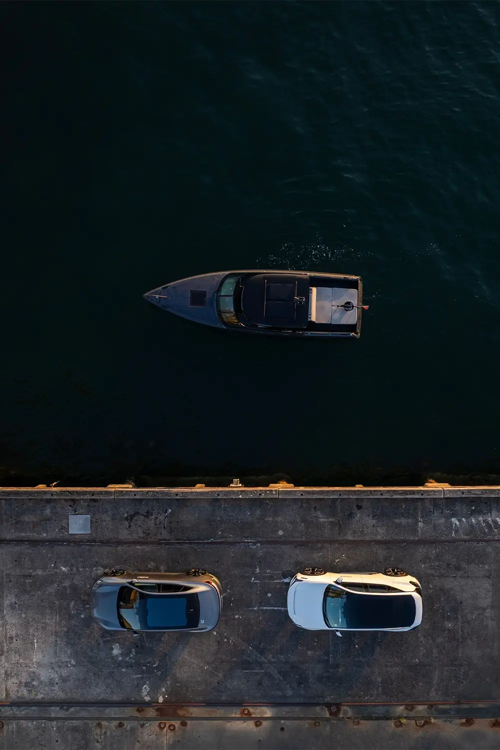 Polestar and Candela collaboration captured at Sydney Harbour Concours d’Elegance, featuring the Candela C-8 Polestar edition electric hydrofoil boat alongside Polestar vehicles, photographed by EDG Studios.