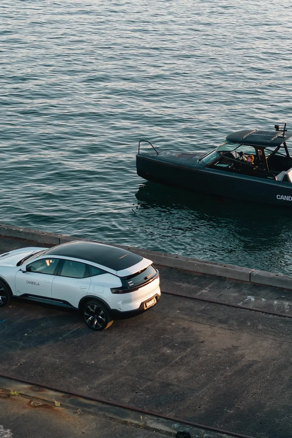 Polestar and Candela collaboration captured at Sydney Harbour Concours d’Elegance, featuring the Candela C-8 Polestar edition electric hydrofoil boat alongside Polestar vehicles, photographed by EDG Studios.