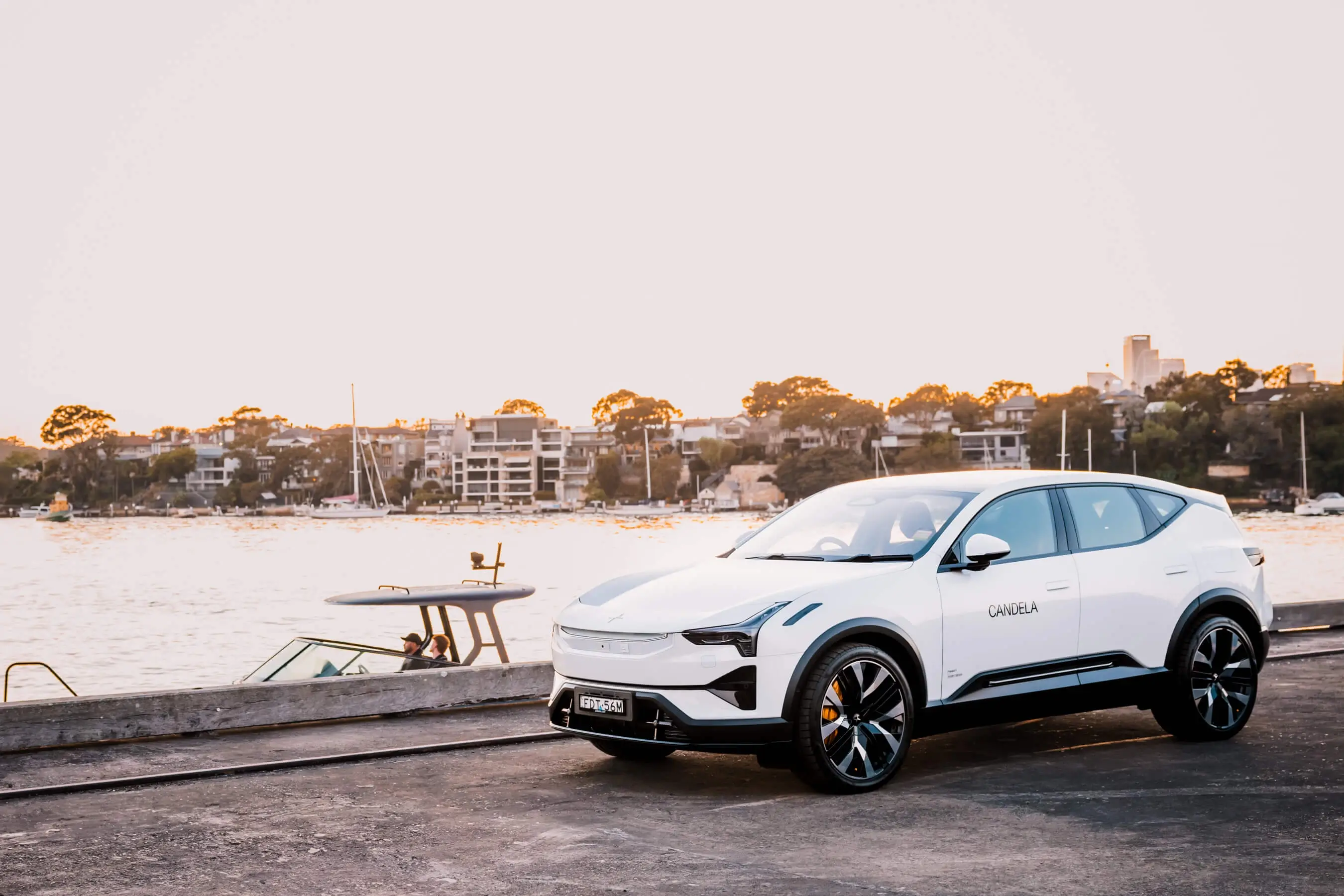 Polestar and Candela collaboration captured at Sydney Harbour Concours d’Elegance, featuring the Candela C-8 Polestar edition electric hydrofoil boat alongside Polestar vehicles, photographed by EDG Studios.