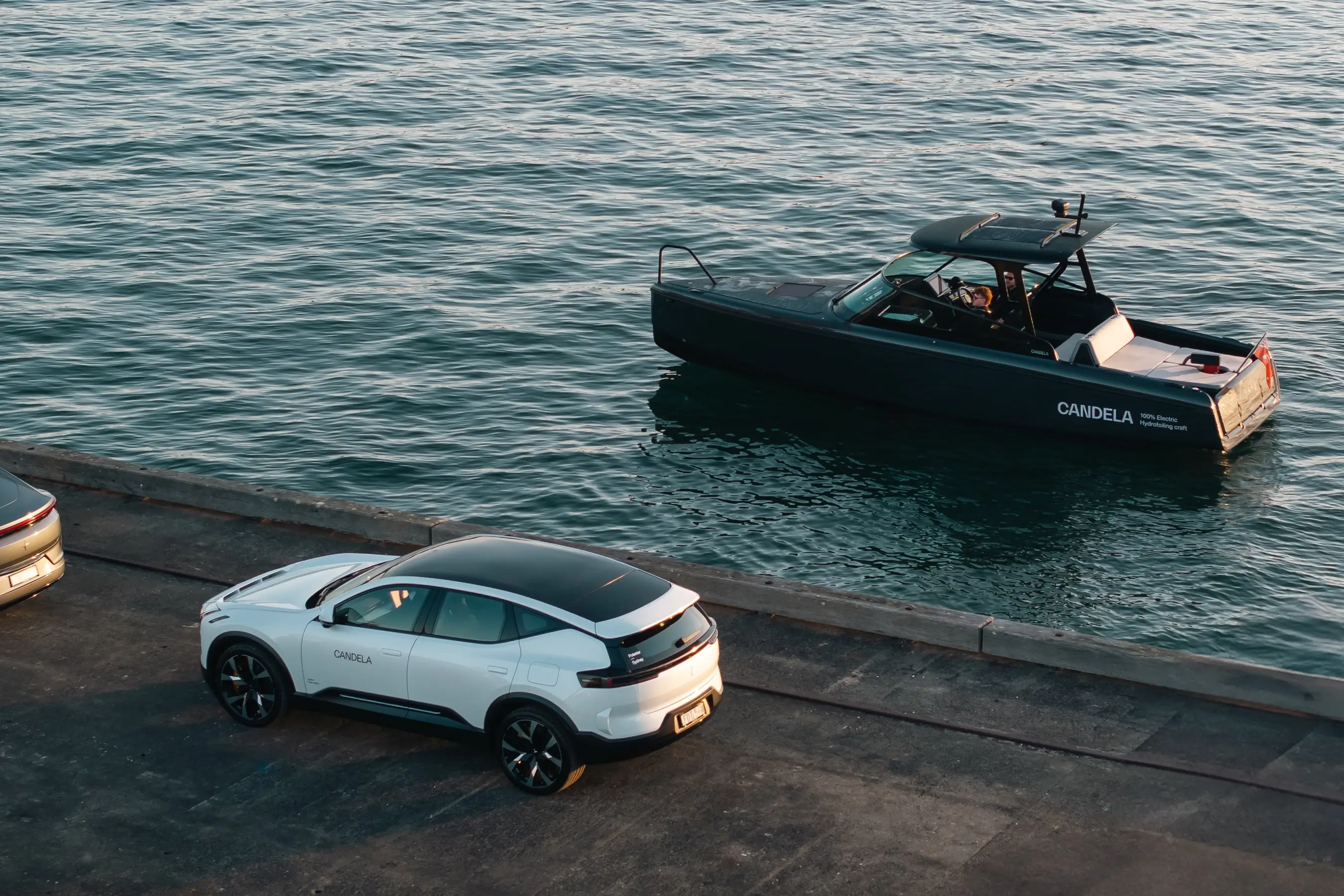 Polestar and Candela collaboration captured at Sydney Harbour Concours d’Elegance, featuring the Candela C-8 Polestar edition electric hydrofoil boat alongside Polestar vehicles, photographed by EDG Studios.