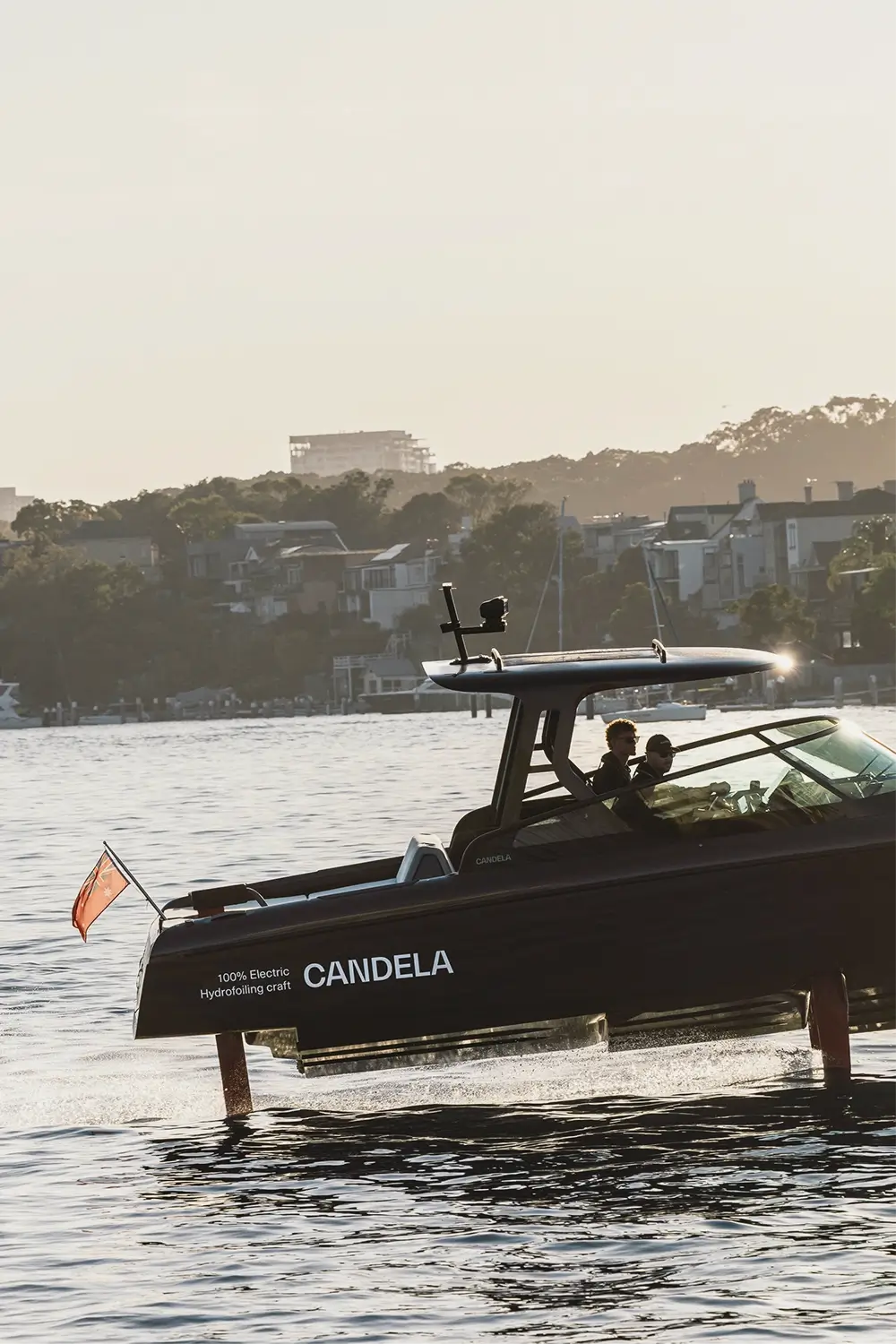 Polestar and Candela collaboration captured at Sydney Harbour Concours d’Elegance, featuring the Candela C-8 Polestar edition electric hydrofoil boat alongside Polestar vehicles, photographed by EDG Studios.