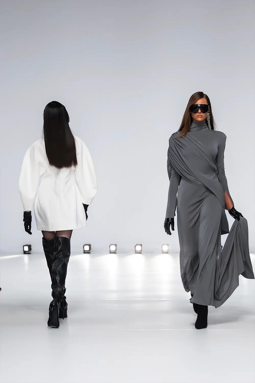 Mariam Seddiq ‘Echoes’ runway show photographed at Australian Fashion Week 2026, featuring sculptural silhouettes, elevated tailoring, leather detailing and contemporary Australian fashion captured in an editorial runway setting.