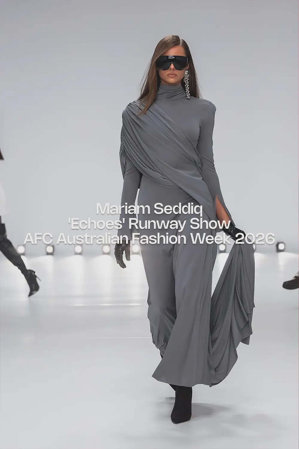 Mariam Seddiq ‘Echoes’ runway show photographed at Australian Fashion Week 2026, featuring sculptural silhouettes, elevated tailoring, leather detailing and contemporary Australian fashion captured in an editorial runway setting.