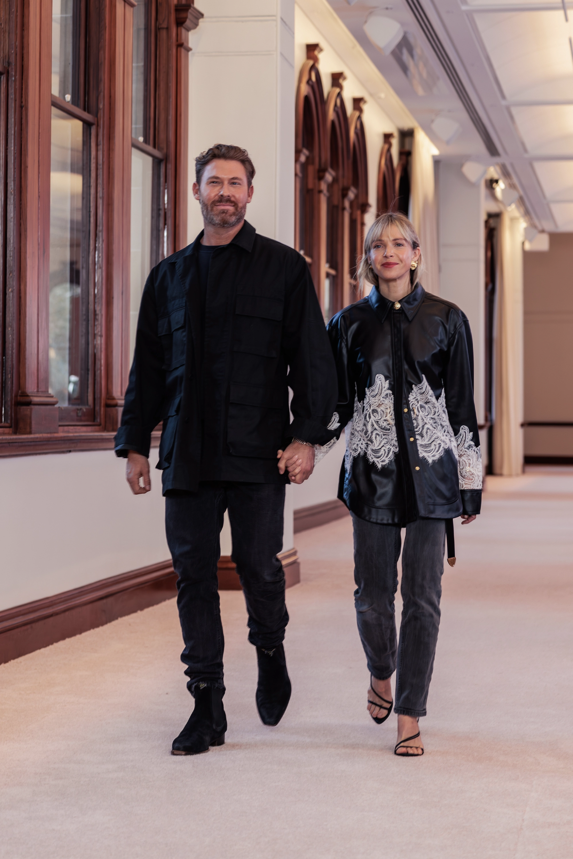 Aje. ‘Siren’ runway show photographed at Australian Fashion Week 2026 at The Lands by Capella Sydney, featuring sculptural resortwear, flowing silhouettes, artisanal textures and contemporary Australian fashion captured in an editorial runway setting.