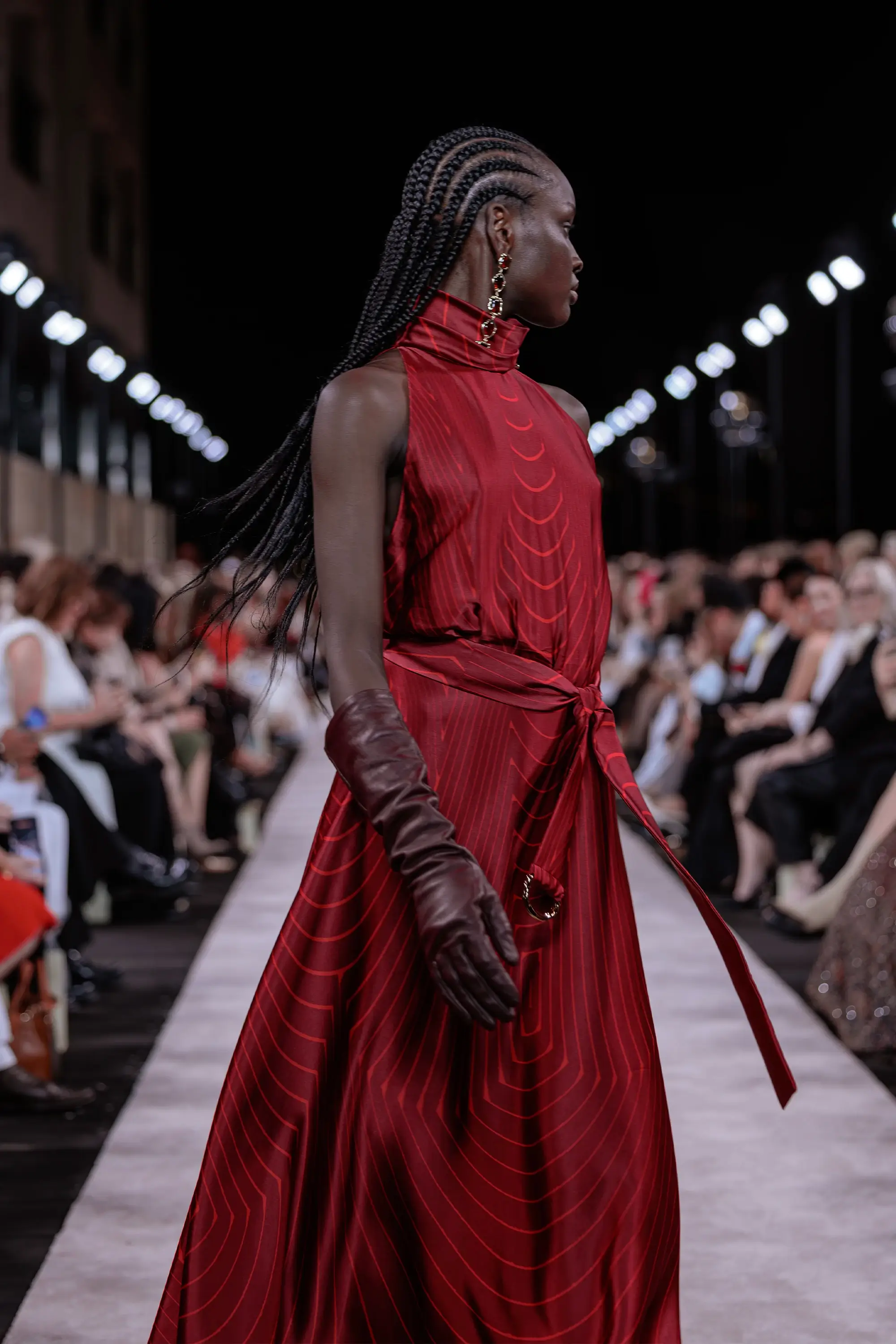 Carla Zampatti ‘Reflections’ runway show photographed at Australian Fashion Week 2026 at the Park Hyatt Sydney Boardwalk, featuring elevated tailoring, fluid silhouettes, shimmering eveningwear and contemporary Australian luxury fashion captured in an editorial runway setting.