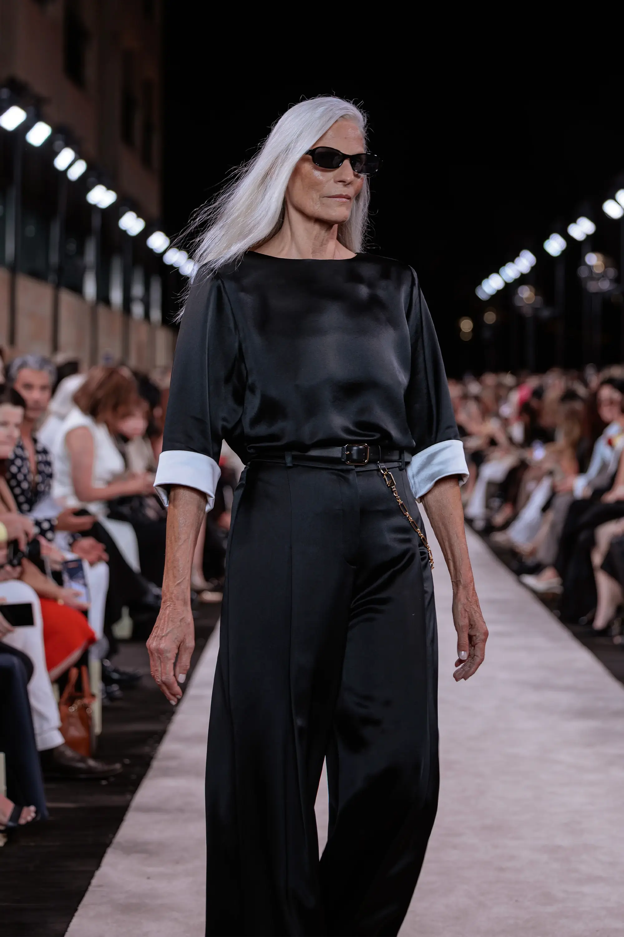 Carla Zampatti ‘Reflections’ runway show photographed at Australian Fashion Week 2026 at the Park Hyatt Sydney Boardwalk, featuring elevated tailoring, fluid silhouettes, shimmering eveningwear and contemporary Australian luxury fashion captured in an editorial runway setting.