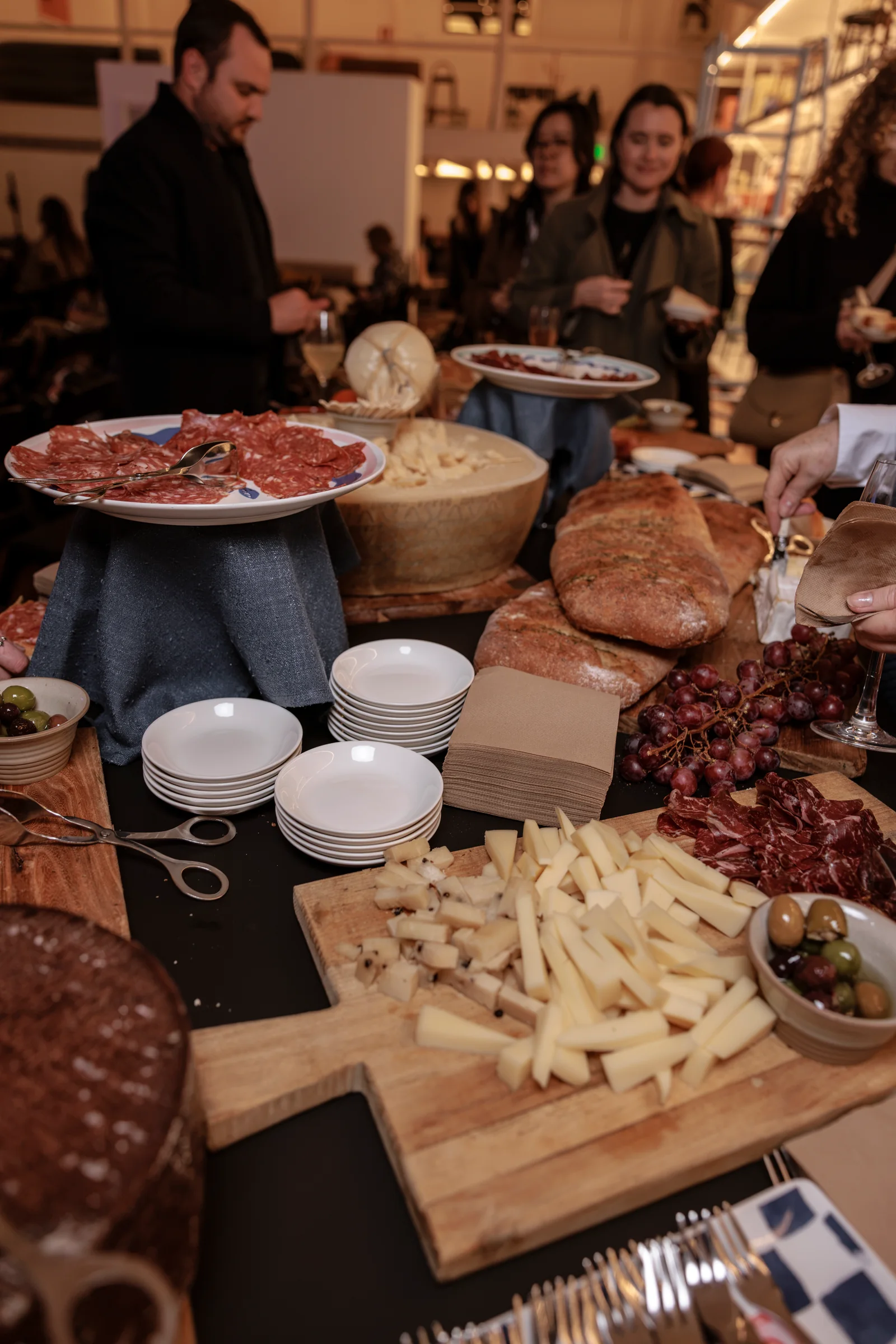 Bread, cheese and sharing platters at the Design By Them evening reception, photographed by EDG Studios.