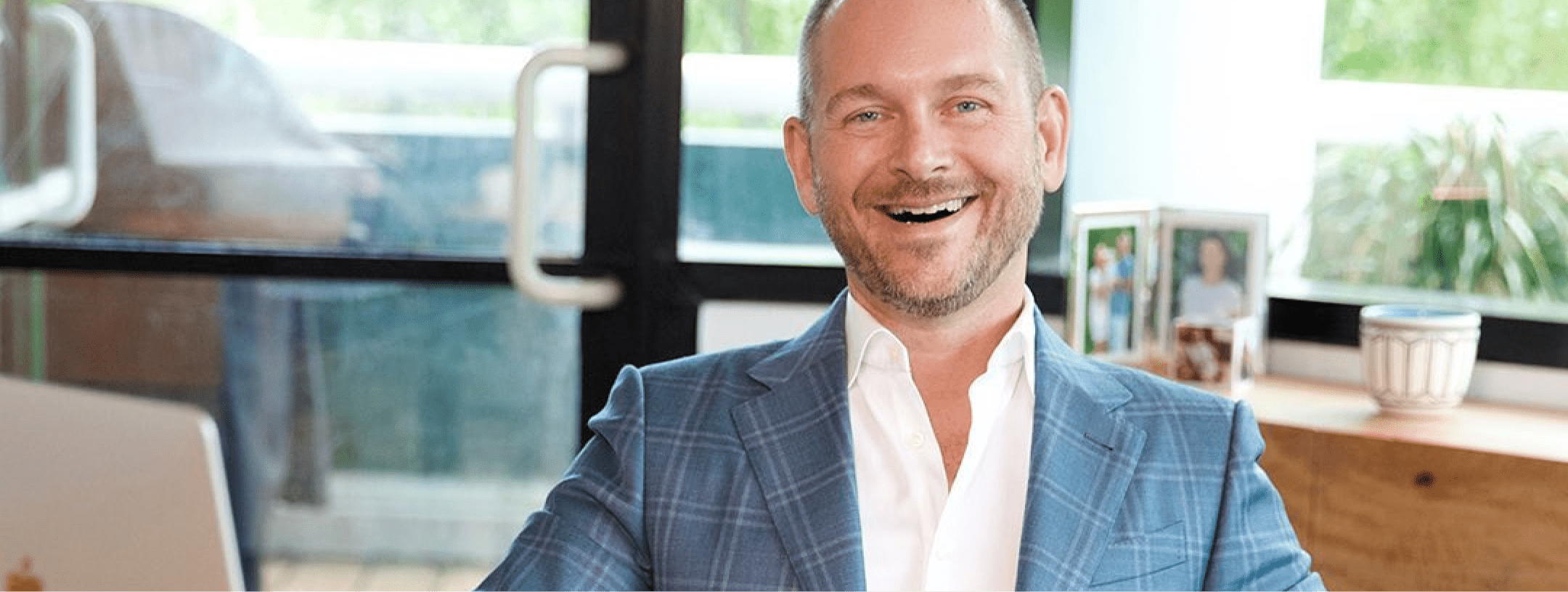 Chris Herman smiling.