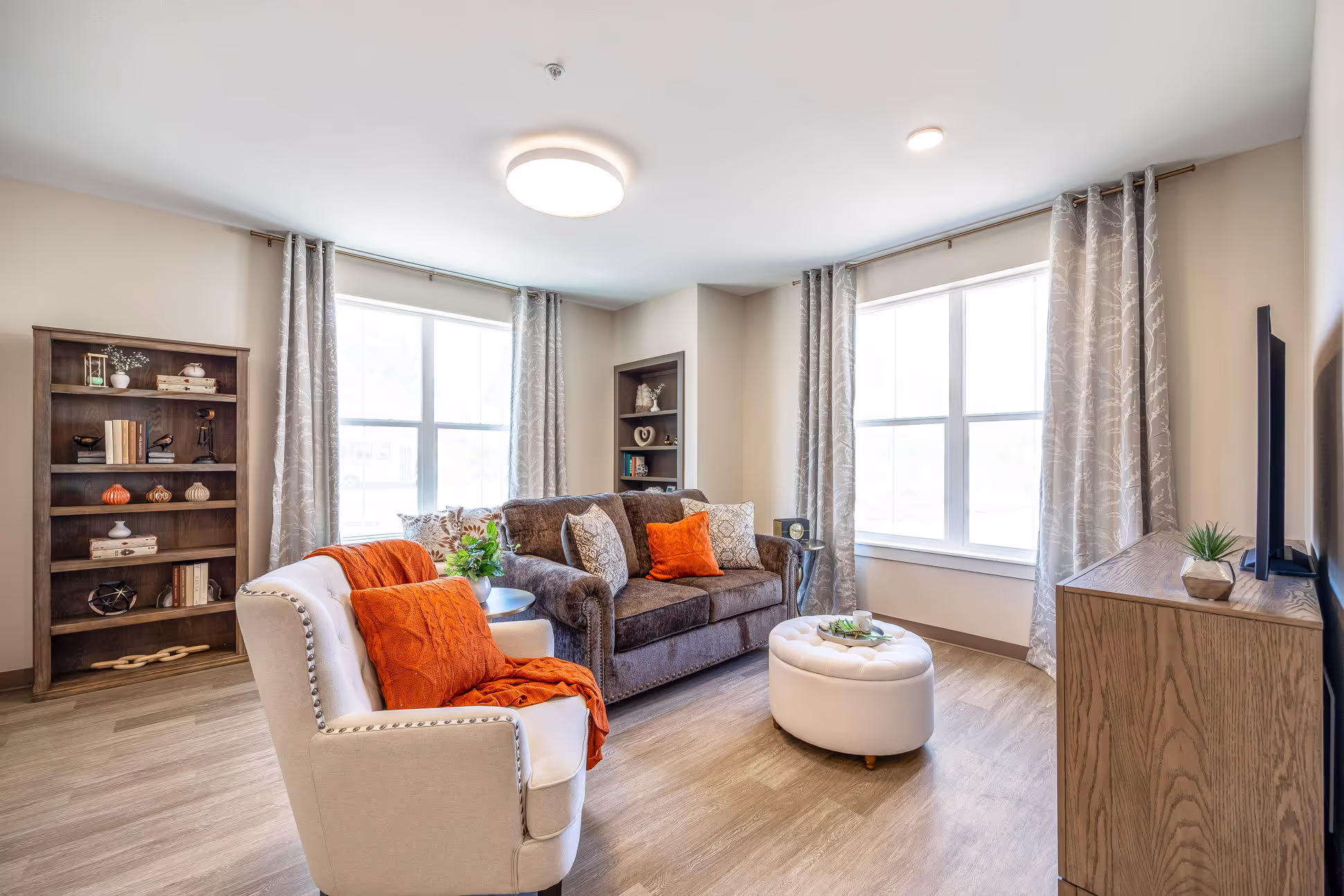 A living room with a tv and a couch