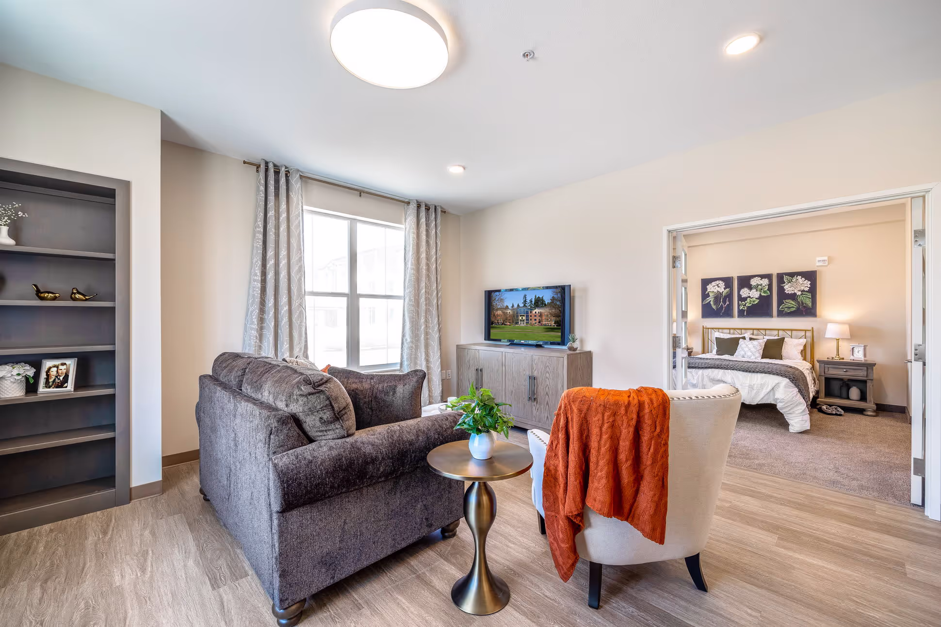 A living room with a tv and a couch