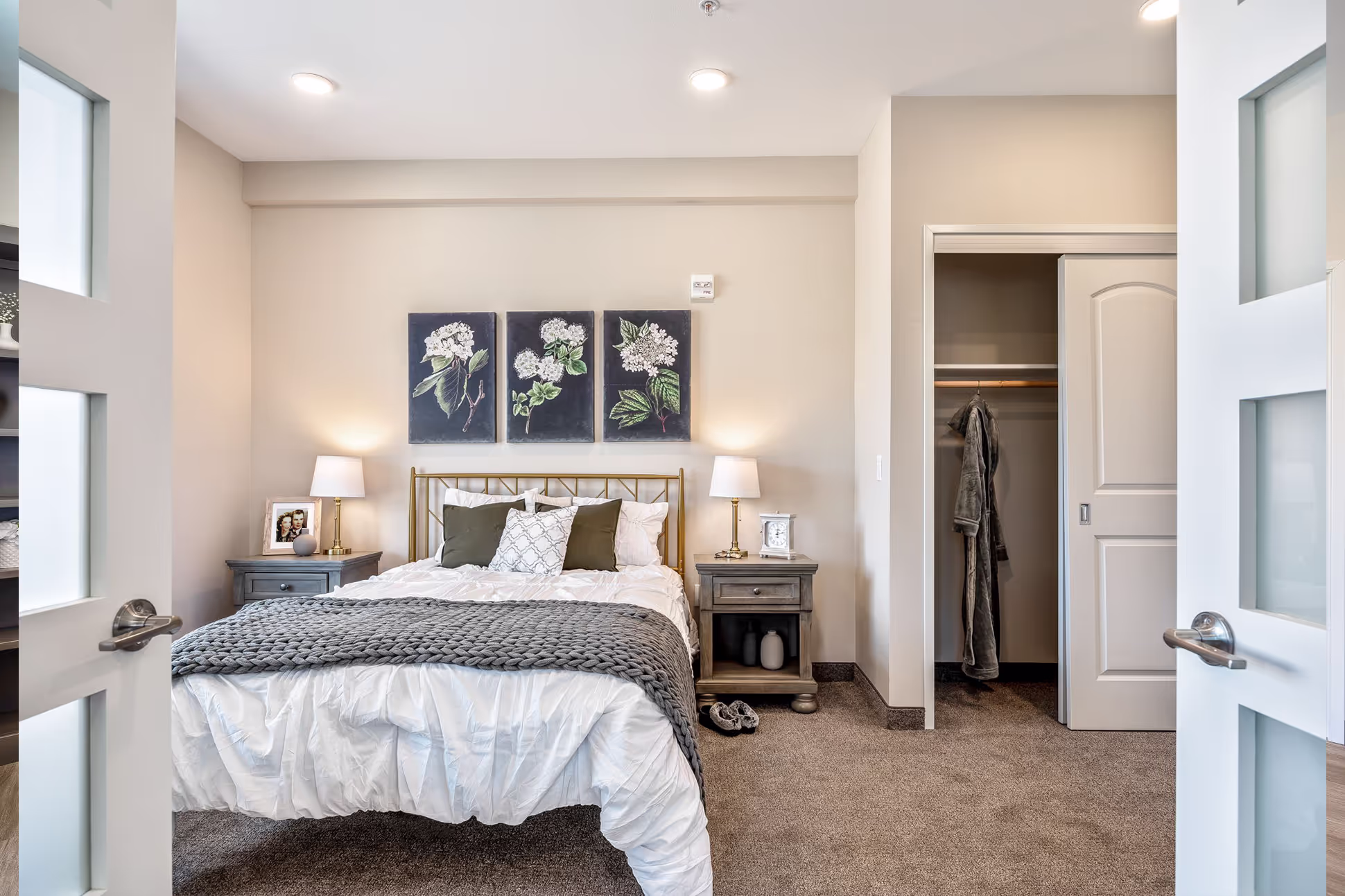  bedroom with a bed, dresser and closet