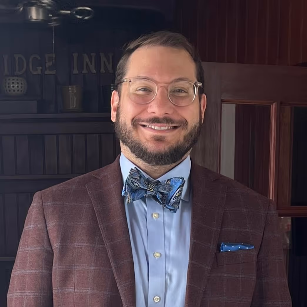 Photo of team member described below
