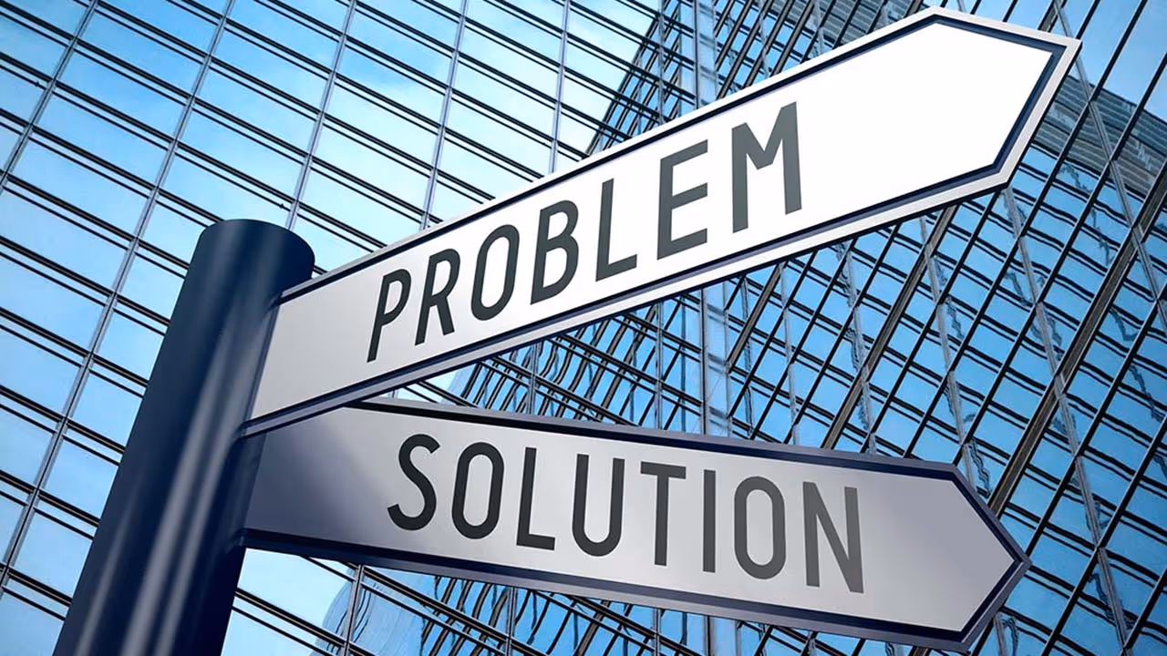 A pair of road signs; the intersection of Problem and Solution