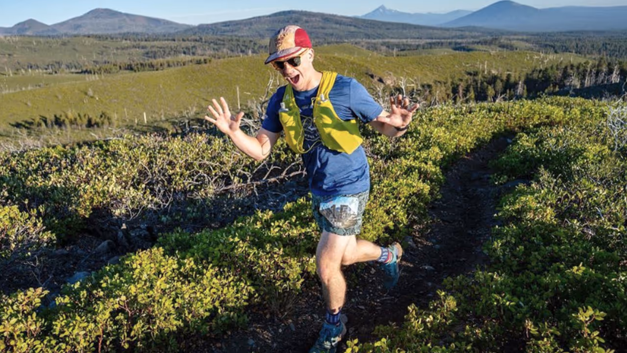 A photograph of Jarred running in a vast, outdoor environment.