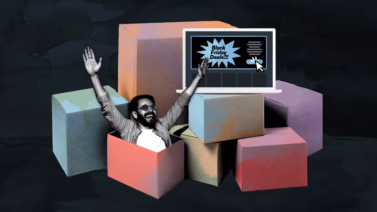 An image of a guy popping out of a box with laptop, shopping for Black Friday