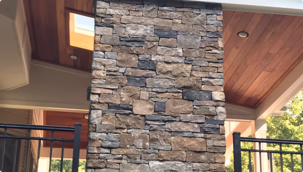 Large house pillar covered with stones 