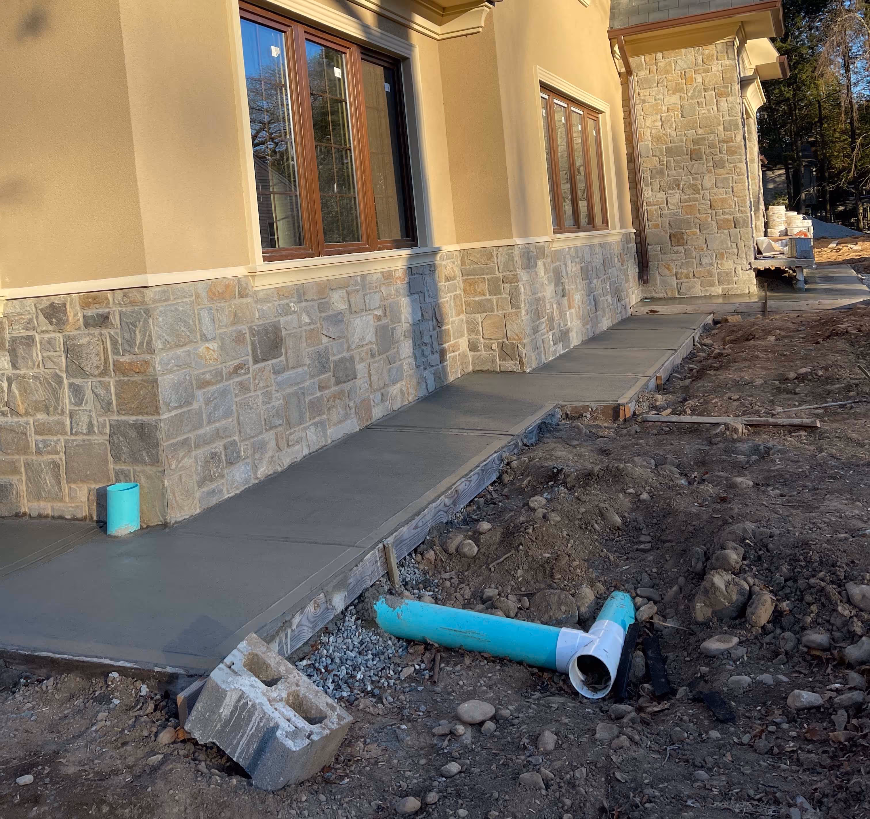 Concrete paving and water drain pipes
