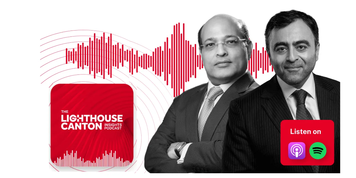 Two men in suits stand against a background of a data graph.