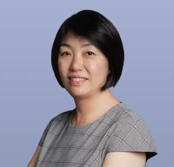 Karen Ong, Executive Director - Investments, smiling.