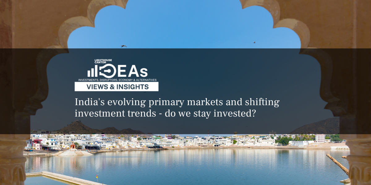 Jaipur cityscape, India, with buildings and a riverfront.