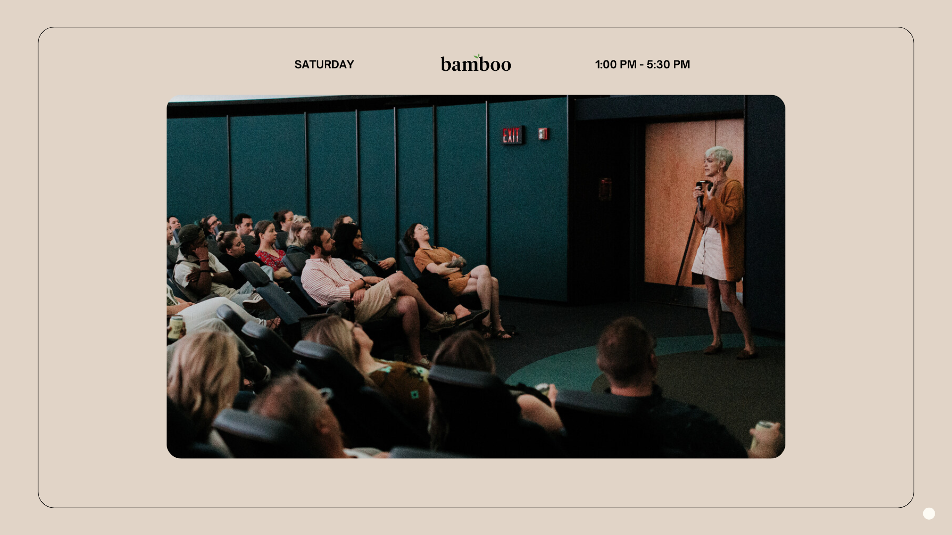 Photo of speaker and audience