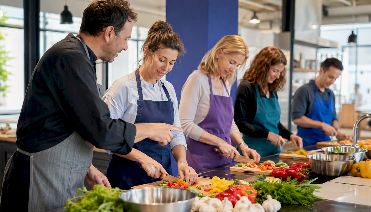 Hands following chef in culinary team building