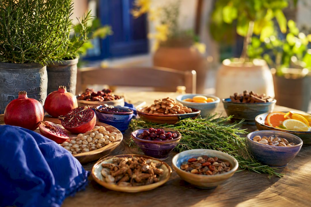 Overhead diverse holiday ingredients on wooden table