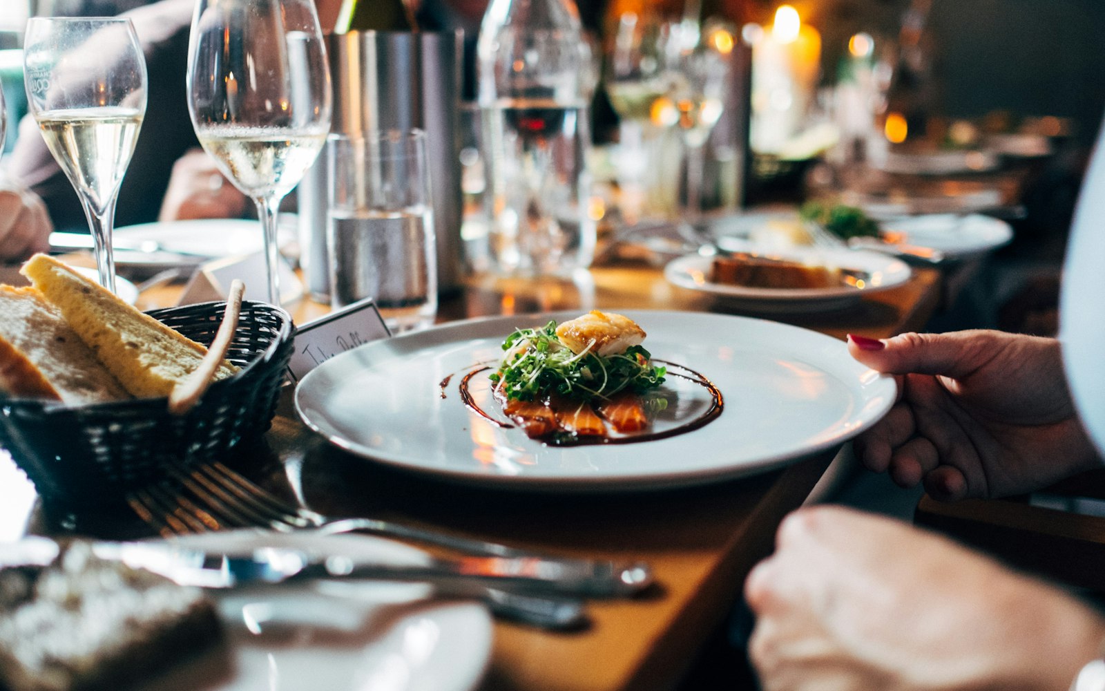 Elegant dinner table with plated food and wine glasses at a private cooking class near Beverly Hills
