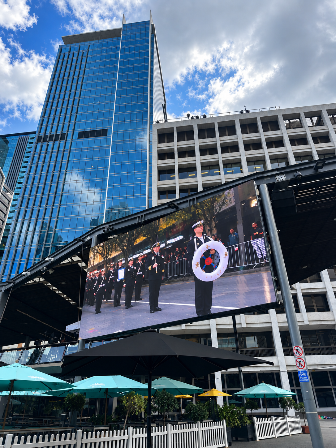 Navy ceremony on the big screen in King George Square