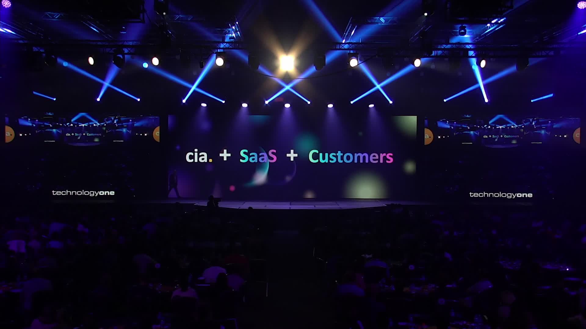 CiA, SaaS and Customers on the LED screens across the stage