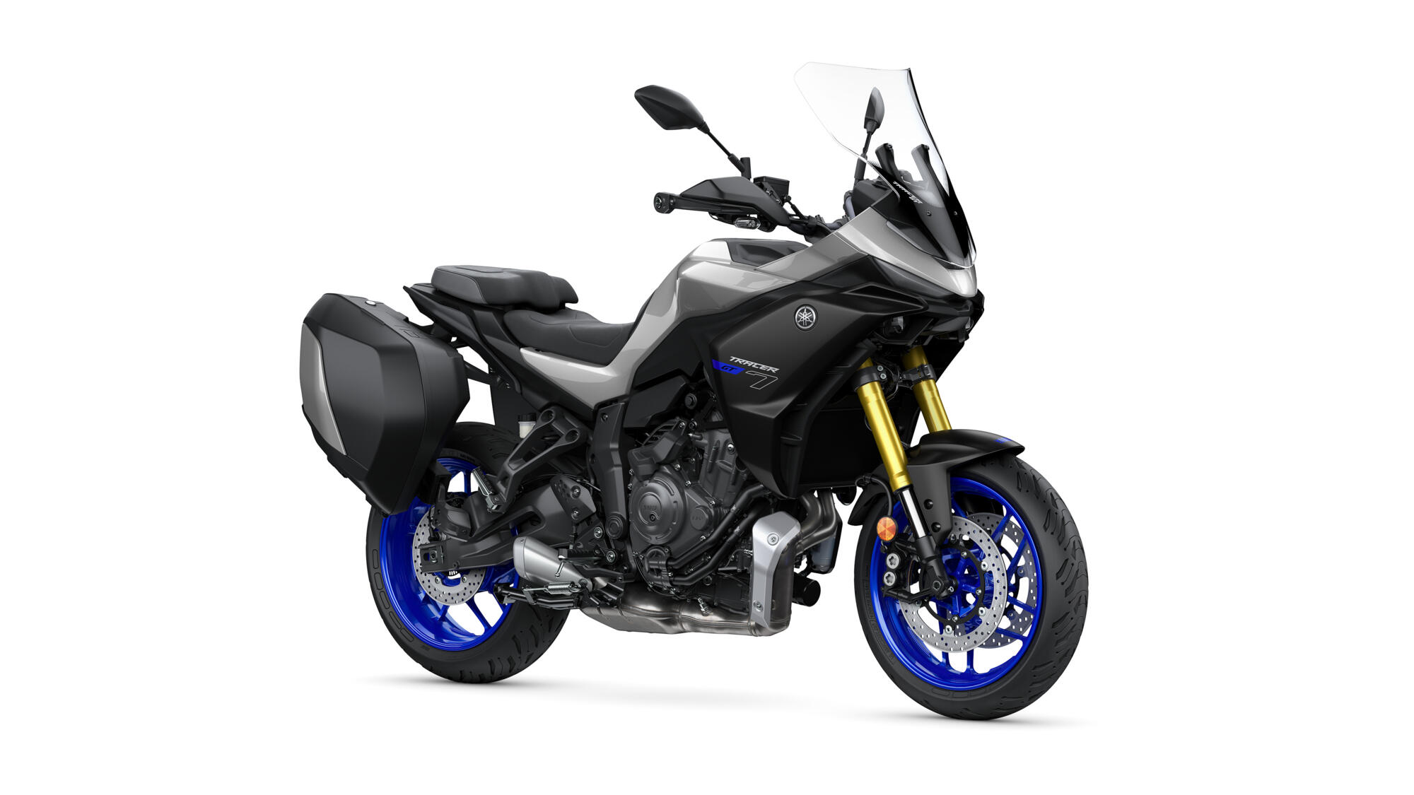Gray and black Yamaha Tracer 7 GT motorcycle with bright blue wheels, gold front forks, and side panniers.