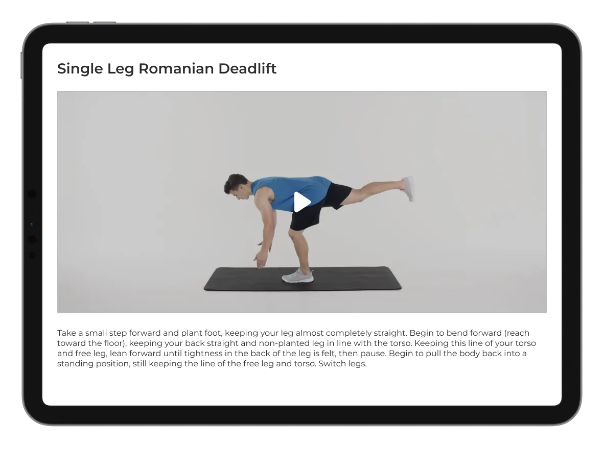 A tablet with a video displaying the correct form for a bodyweight exercise