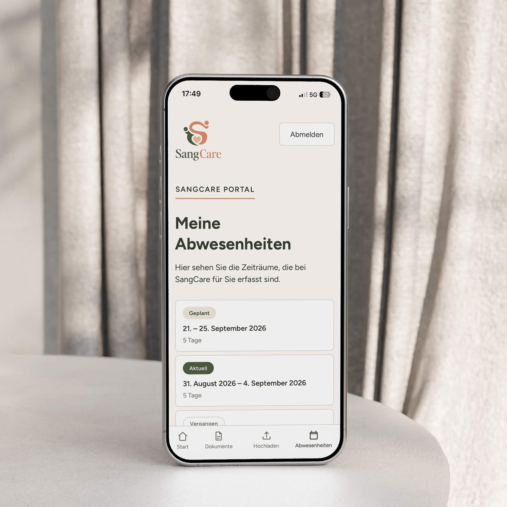 Smartphone showing the SangCare staff portal, “My absences” view