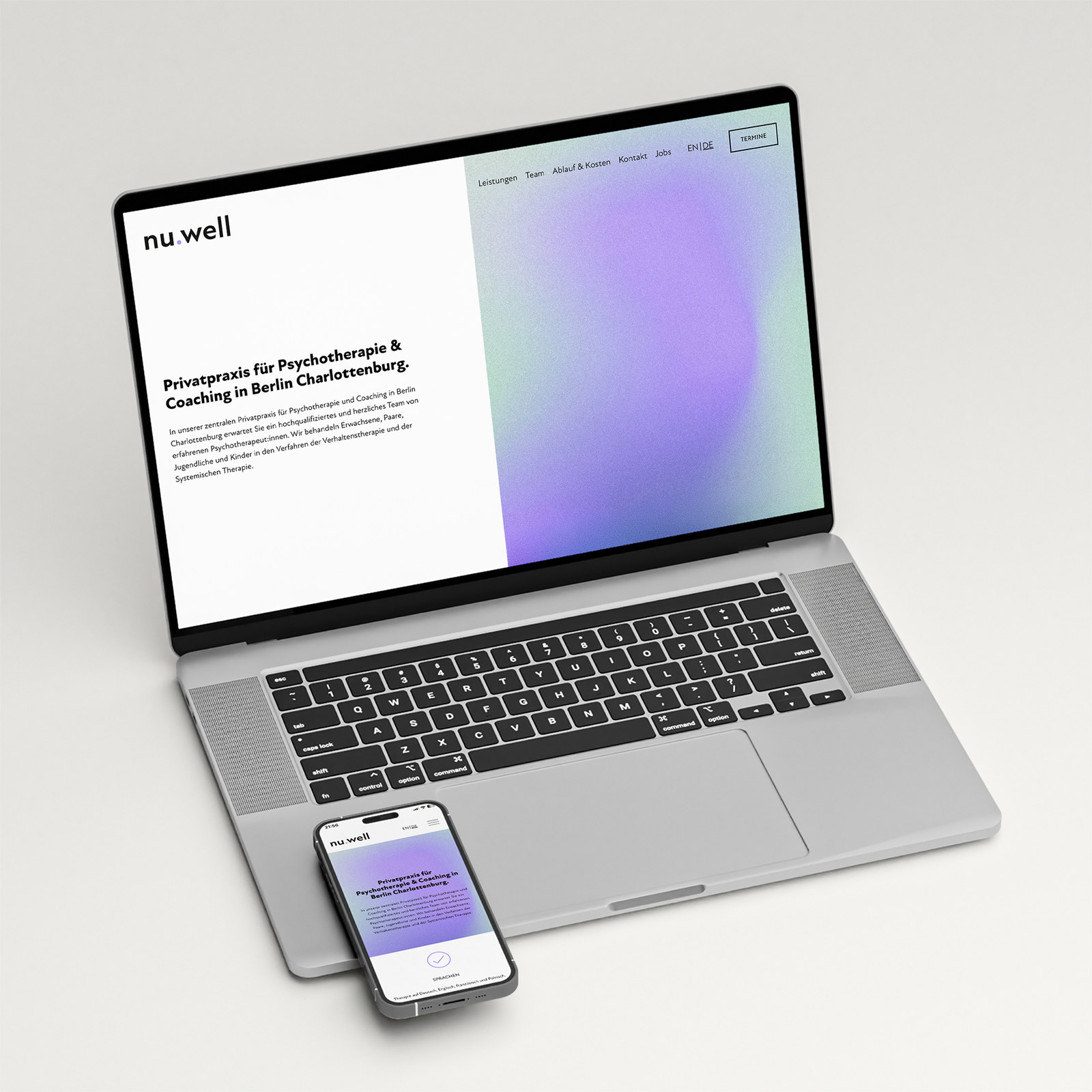 Website of the psychotherapy practice nu:well on a laptop and smartphone