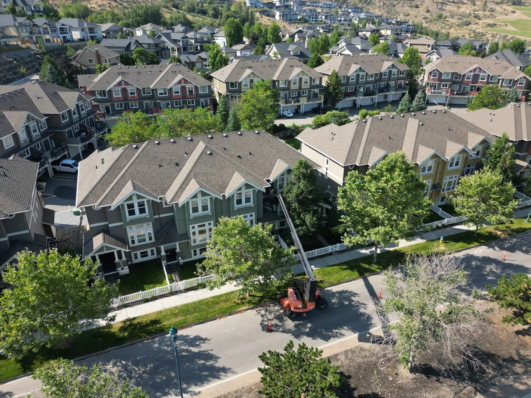 Aerial view of a townhome complex being repainted by Pro Works Painting
