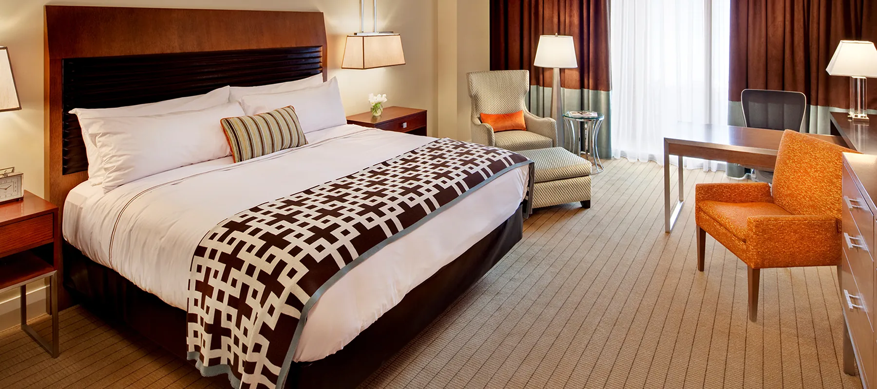 Hotel room bed dressed with Northern Feather bedding