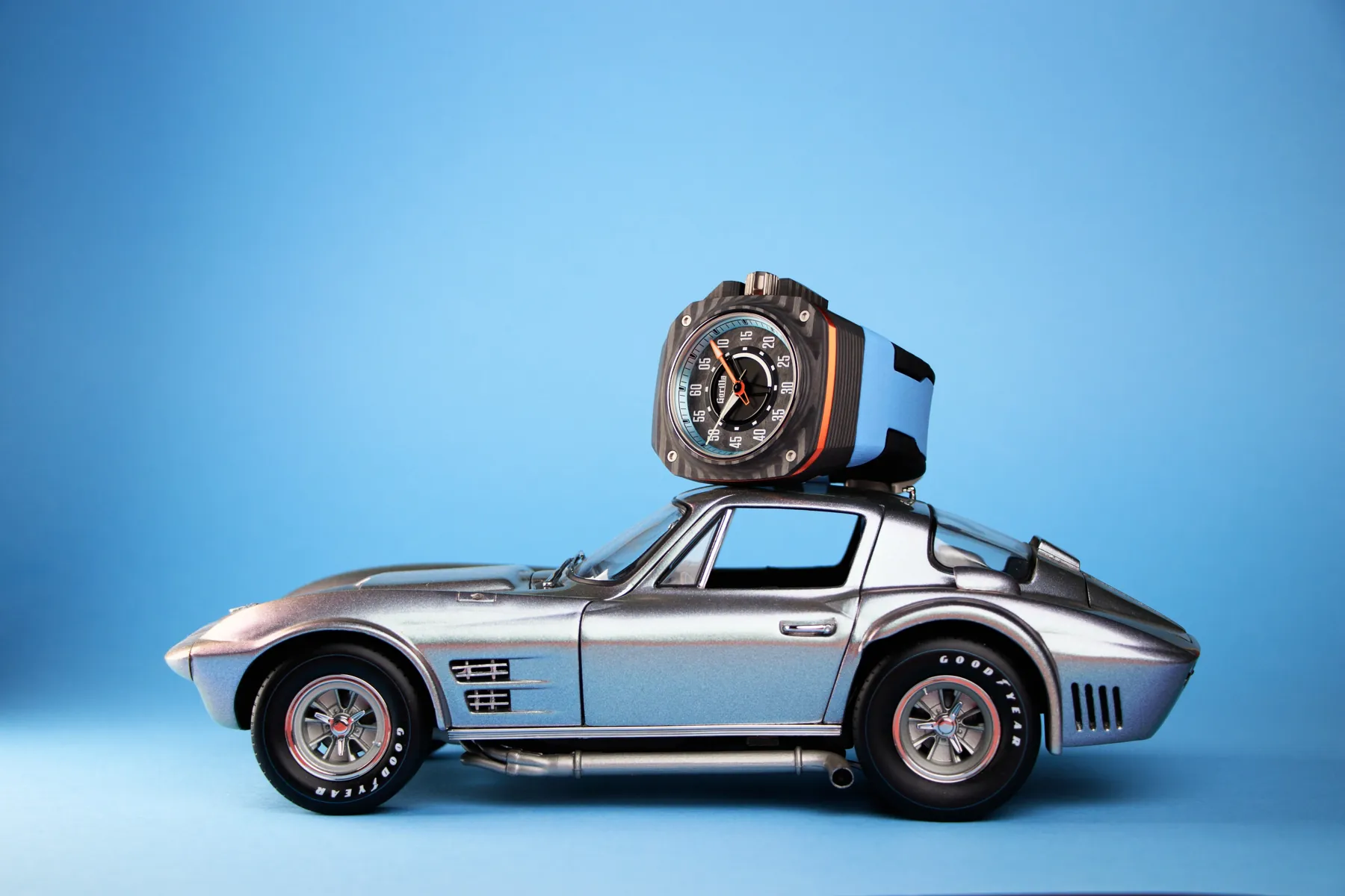 Gorilla Fastback watch on top of a silver vintage sports car model