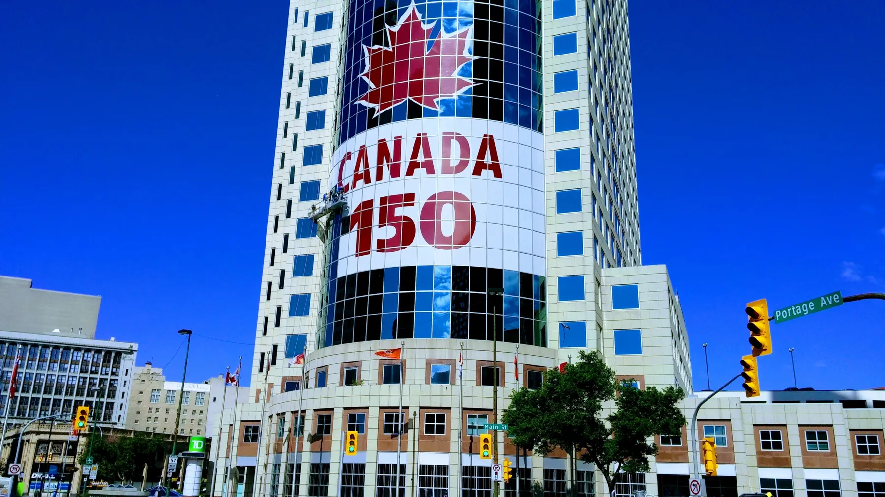 Downtown Winnipeg tower with Canada 150 window graphics