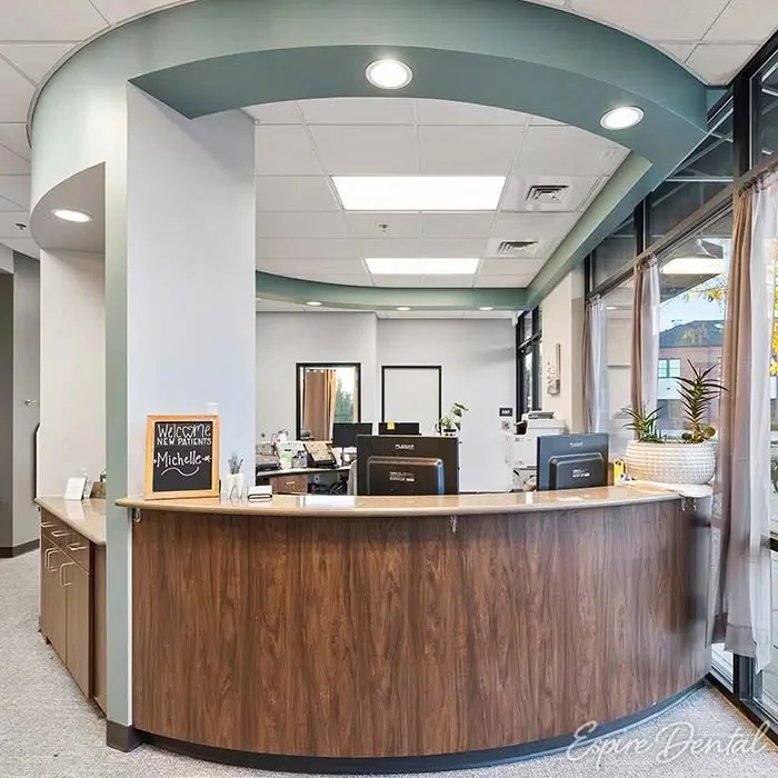 Curved reception desk at an Espire Dental office